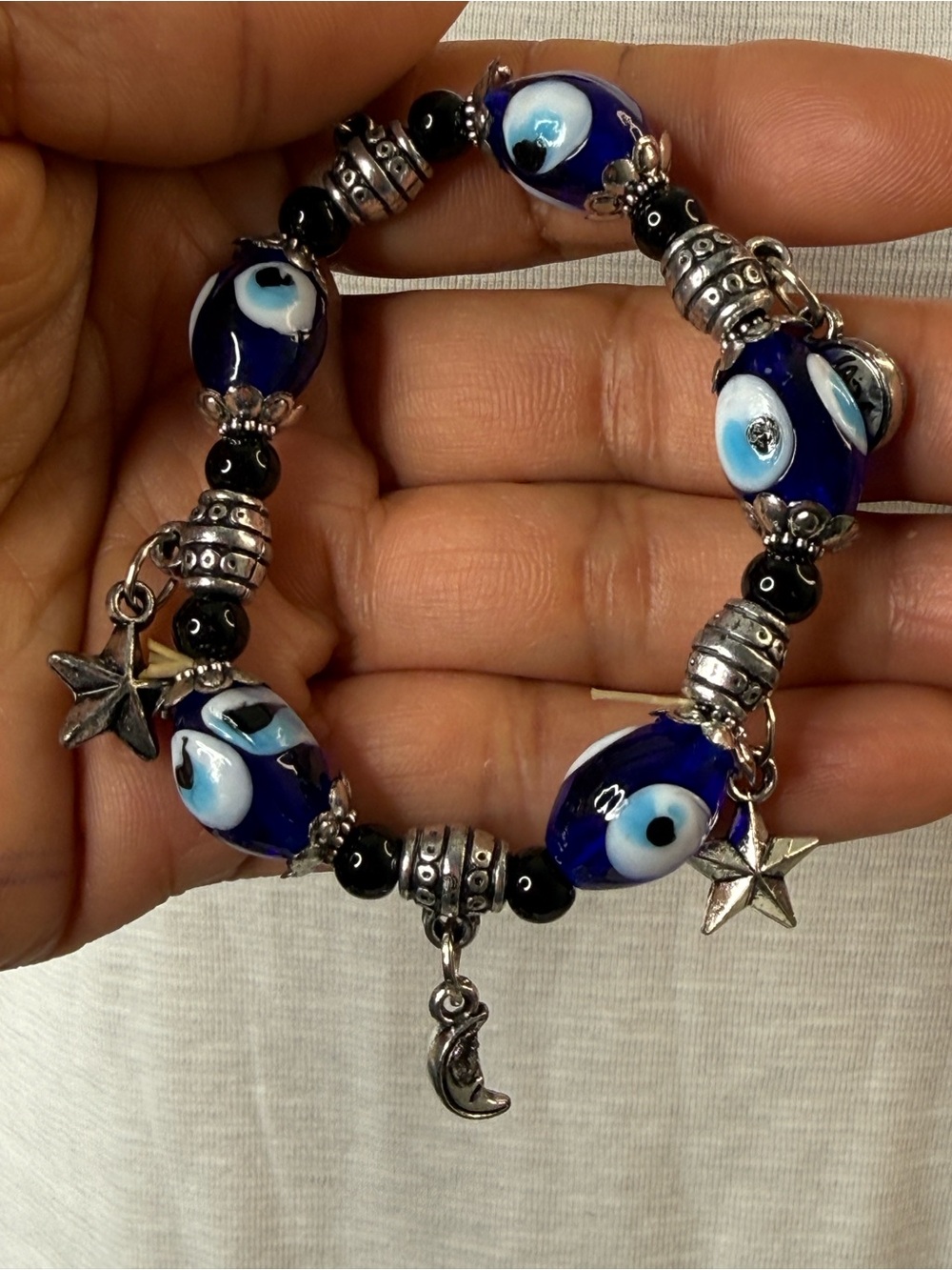 Handmade Blue Evil’s Eye Bracelet lwith Stars and Moons Charms - NWOT
